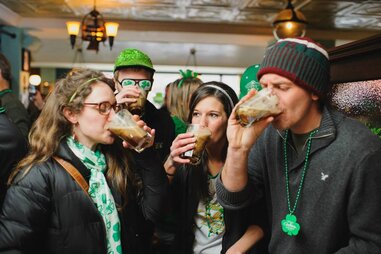 drinkers at the liffey on st. patrick’s day