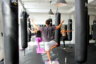 Yoga class man in fitness classes