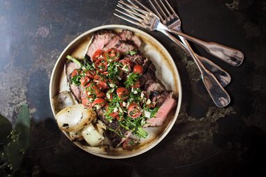 steak with tomatoes and onions from Supper