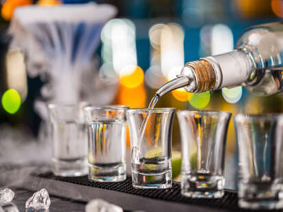 shots, shot glasses, bartender pouring shots