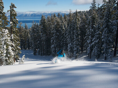 Skier going down mountain