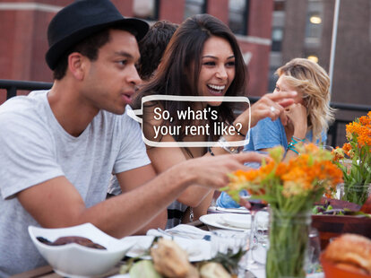 Young people on NYC rooftop talking and laughing