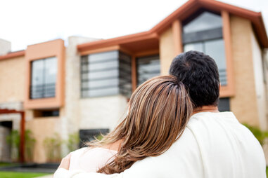 couple in the process of buying a house myths about happiness