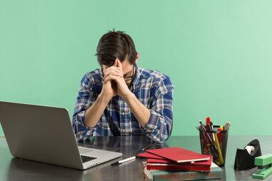 man stressed at work