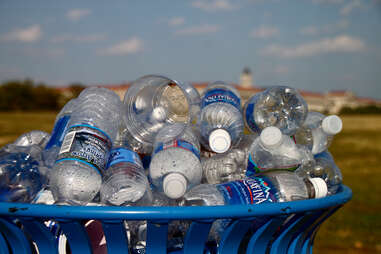 water bottles in a recycling can