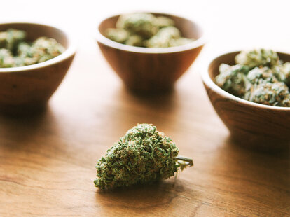 Marijuana bud and bowls of weed