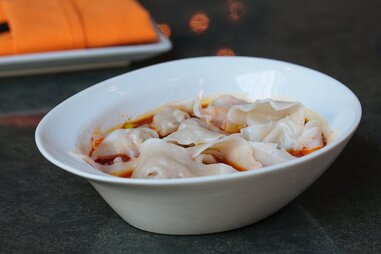 dandan philadelphia dumplings in chili oil sauce