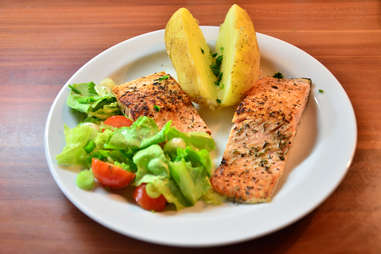 Salmon and lemon on plate