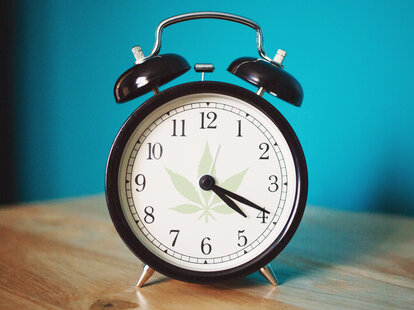 Clock with marijuana leaf