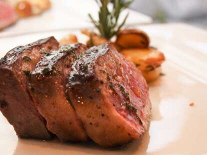 Toscana New York steak served with roasted potatoes and a touch of chopped rosemary