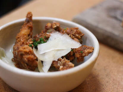 Fried Qual with Stewed Onions at State Bird Provisions