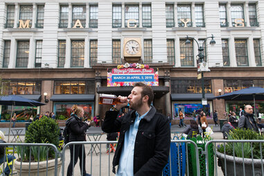 Man drinking in front of Target