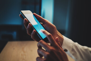 woman checking her phone