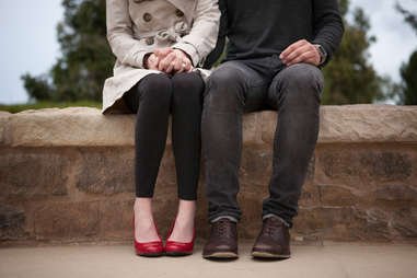 man and woman holding hands