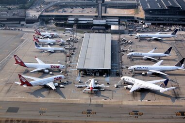airplanes docked at an airport