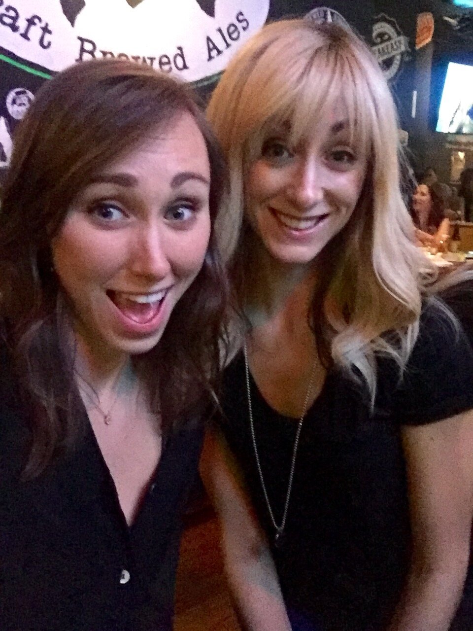 friends at a bar blonde and brunette