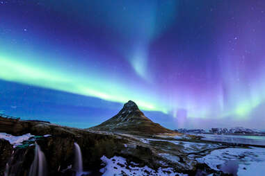 Kirkjufell mountain in Iceland with Northern Lights