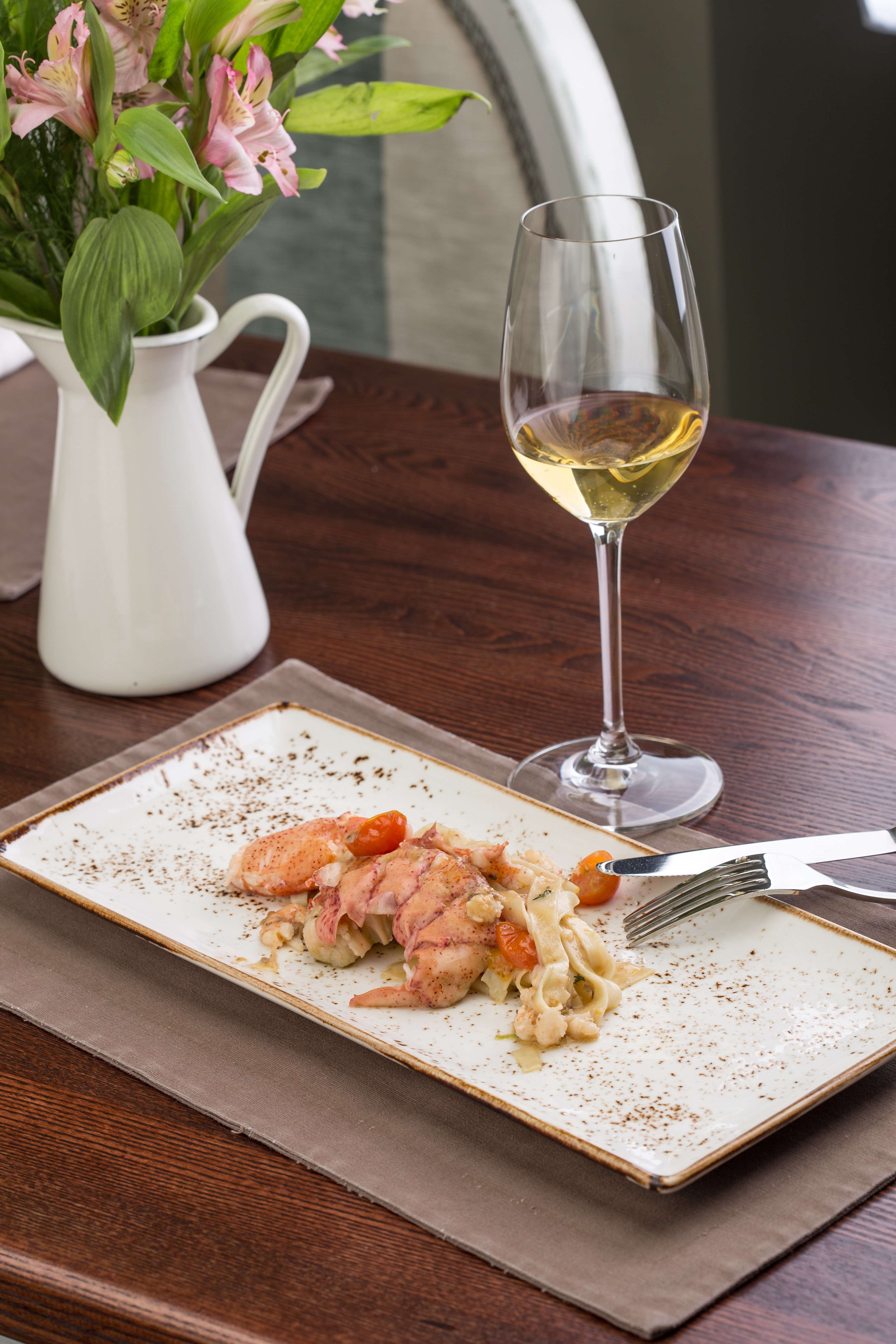 white wine and lobster dish