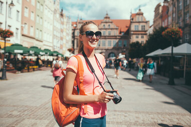 woman with camera travel