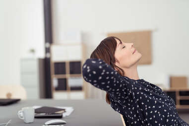 woman relaxing in work office