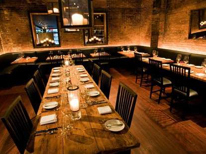 Restaurant Marc Forgione new york interior brick lined walls rustic wood thrillist