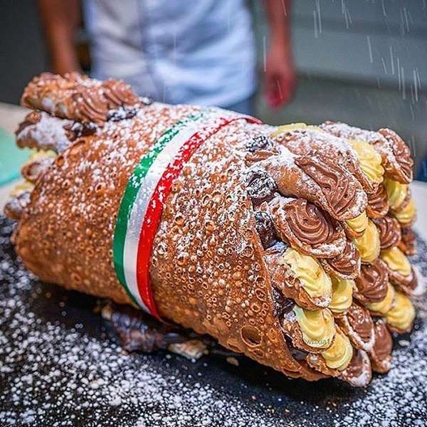 The Bazooka Cannoli From Pasticceria Caruso Is Stuffed With 50 Regular