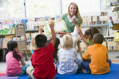 teacher reading to a class