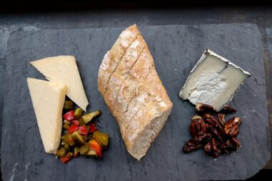 cheese and bread board at The Cellar BCNY