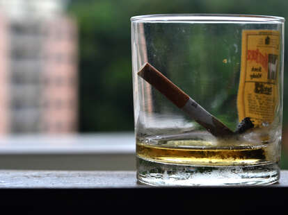 cigarette and whiskey glass thrililst