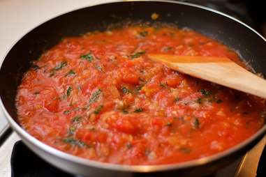 tomato sauce in pan making a pan sauce