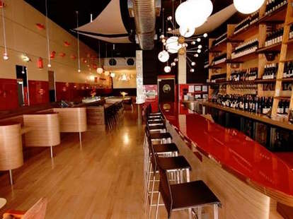 Amelie New York interior bar tables light wood thrillist wine bar