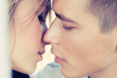 couple kissing mono close up