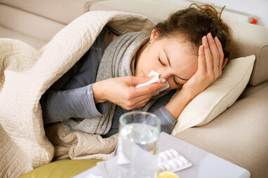 woman with the flu sick