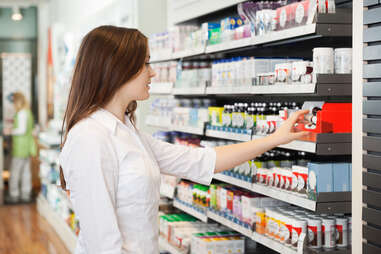 woman shopping for medicine pharmacy
