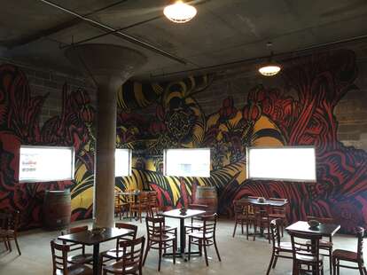 18TH STREET BREWERY interior painted walls tables thrillist