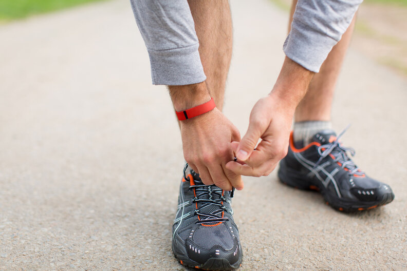 man wearing fitbit flex