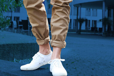 man in cropped pants