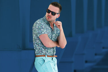 man in floral shirt