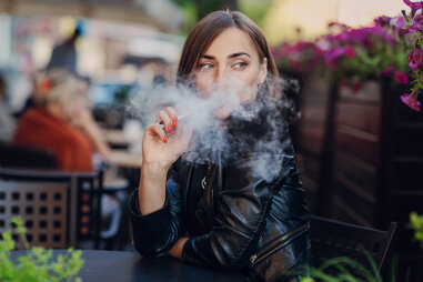 woman smoking vaporizer