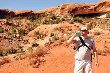 drinking water while hiking