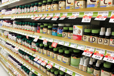 shelves of multivitamin bottles
