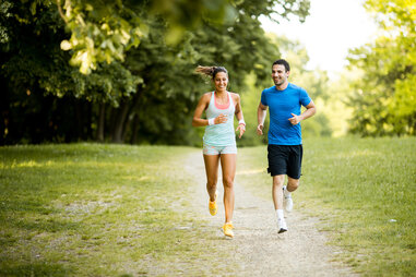 man and woman running