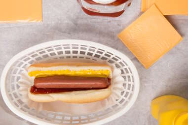 hot dog with mustard ketchup American cheese