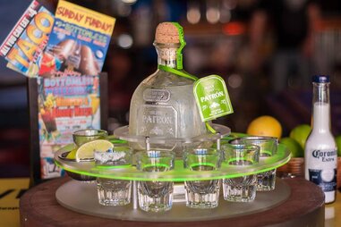 Cabo Cantina tequila shots neon green tray