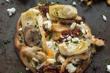 pesto chicken artichoke pizza