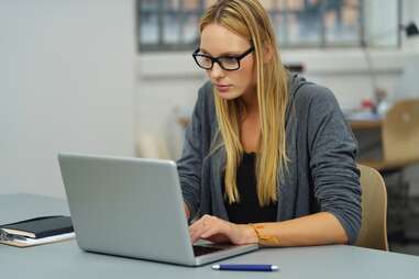 Focused girl on laptop