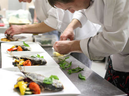 Chefs preparing ingredients