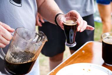 pitcher of stout beer at festival