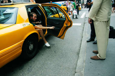 man getting out of taxi cab