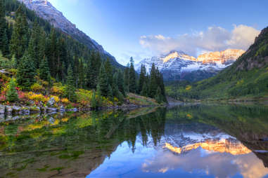 mountains surrounding a lake